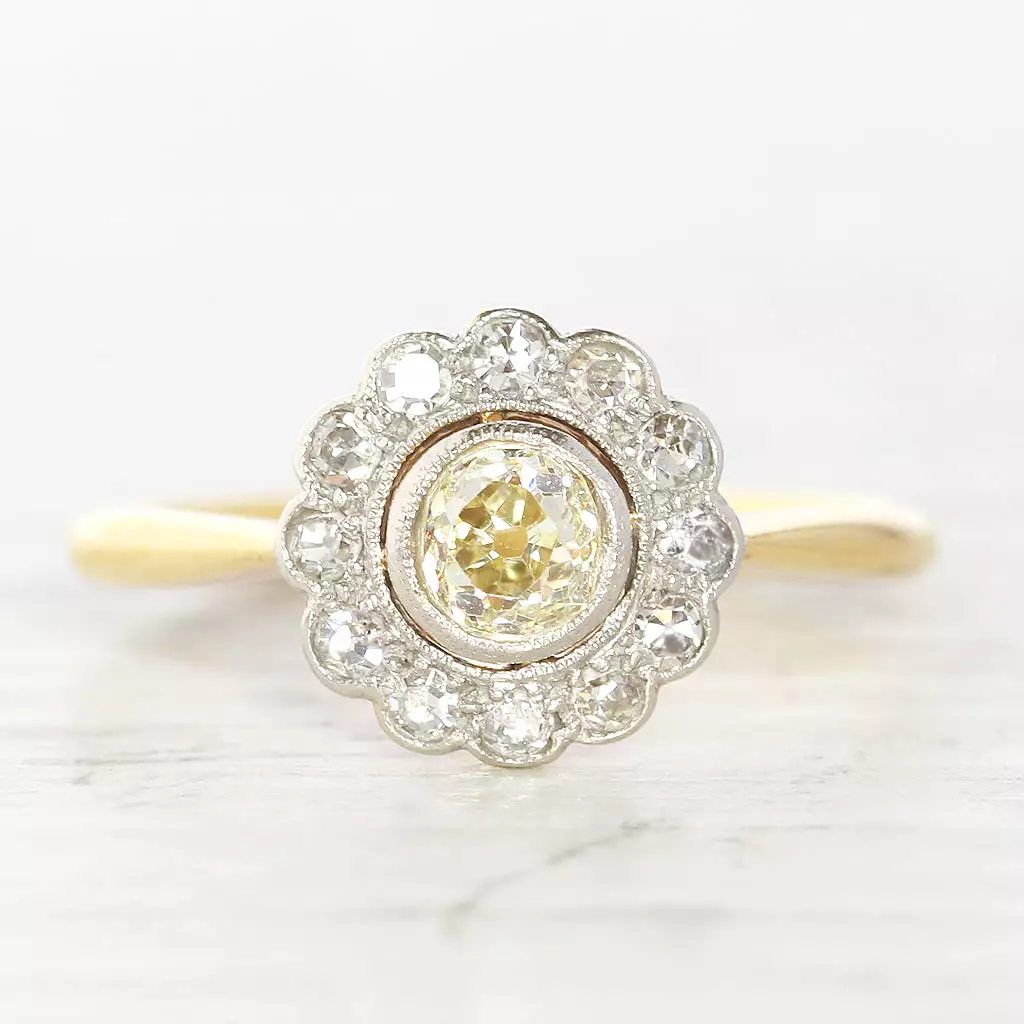 Edwardian 0.69 Carat Old Cut Diamond Daisy Cluster