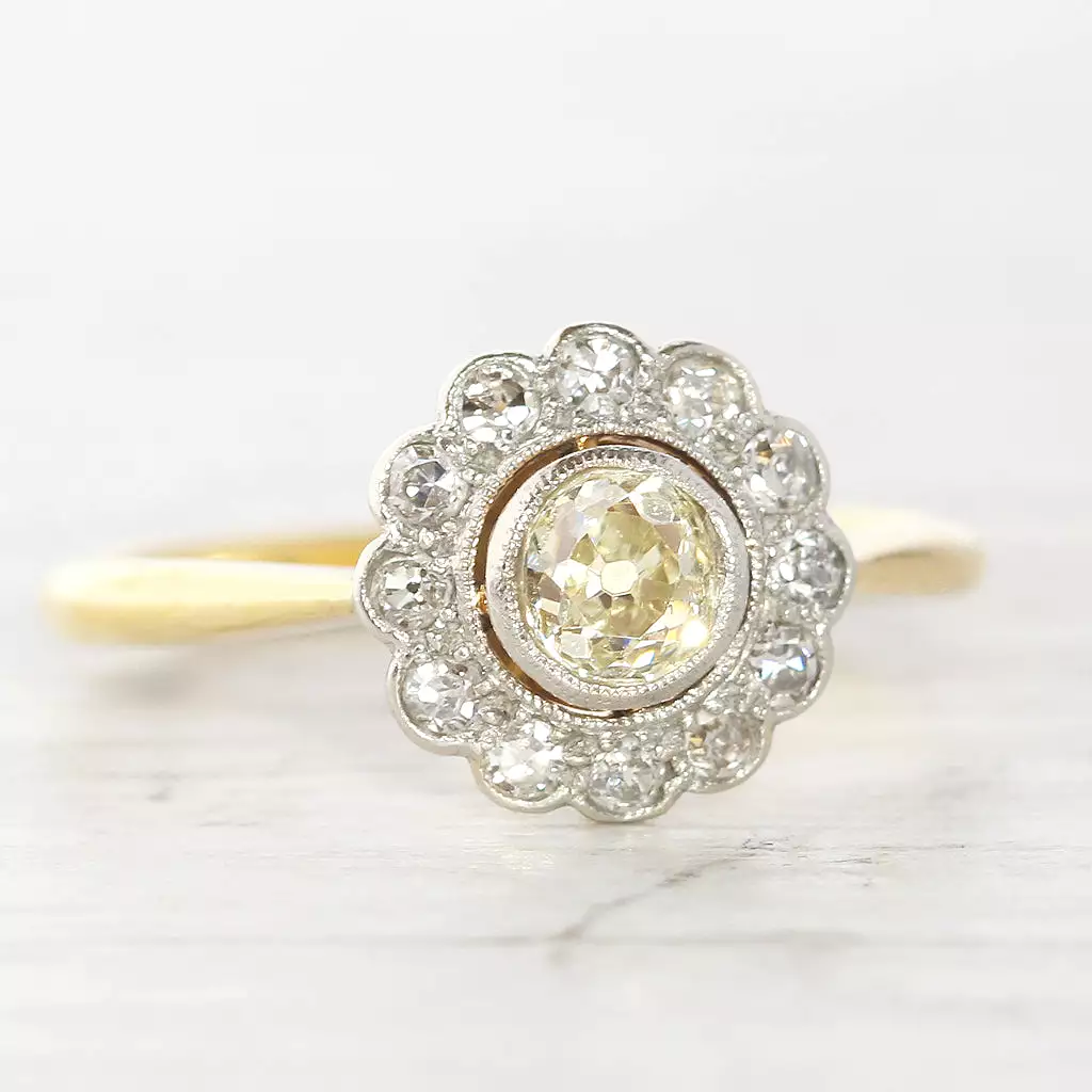 Edwardian 0.69 Carat Old Cut Diamond Daisy Cluster